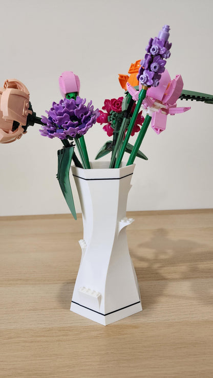 White and black LEGO-Compatible Vase with LEGO flowers and green LEGO stems
