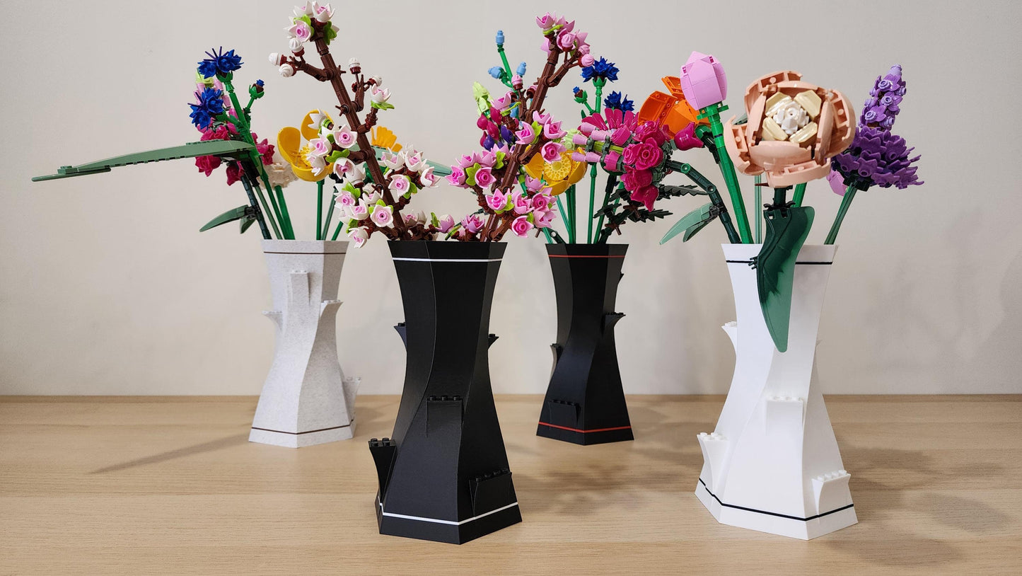 Black and white LEGO-Compatible Vases displayed with colourful Lego flowers