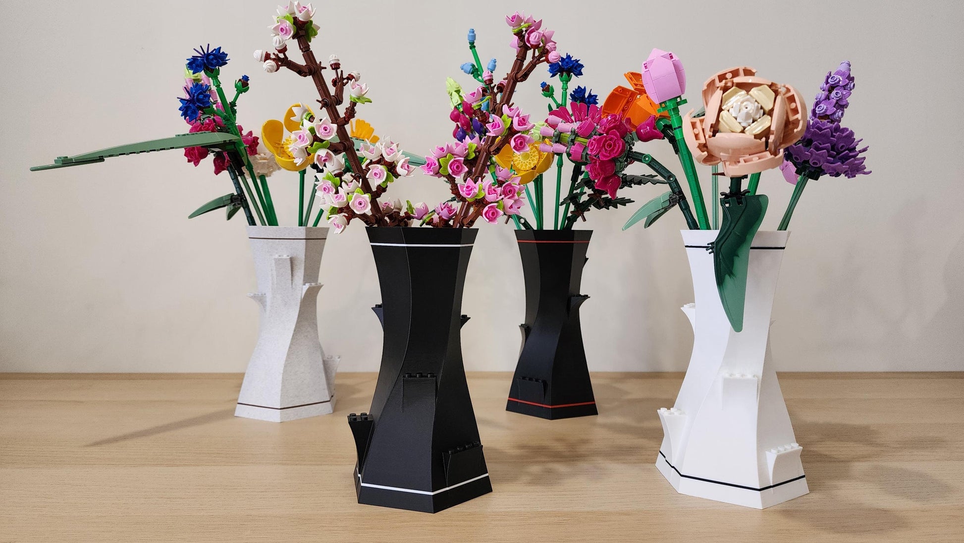 Black and white LEGO-Compatible Vases displayed with colourful Lego flowers