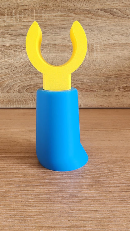 Blue Minifig-Inspired Headphone Holder upright on a wooden tabletop