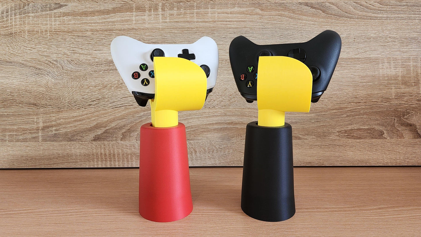 Red and black Minifig-Inspired Headphone Holders with LEGO-style hand grips